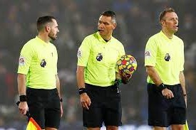 When watching a football match, the referee walking around the pitch with the players often gets the headlines, How many referee in football
